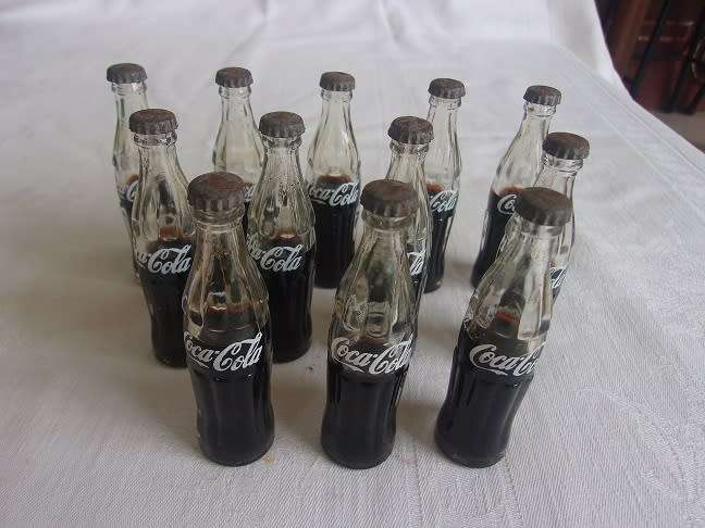 Vintage miniature red Coca-Cola crate with 12 glass miniature Coca-Cola bottles