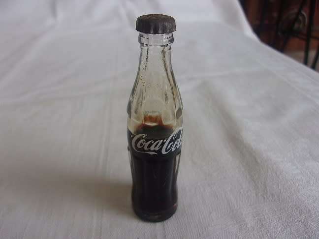 Vintage miniature red Coca-Cola crate with 12 glass miniature Coca-Cola bottles