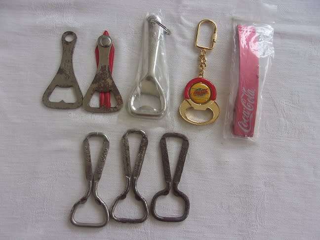 Lot of 8 vintage Coca-Cola bottle openers for 1 bid