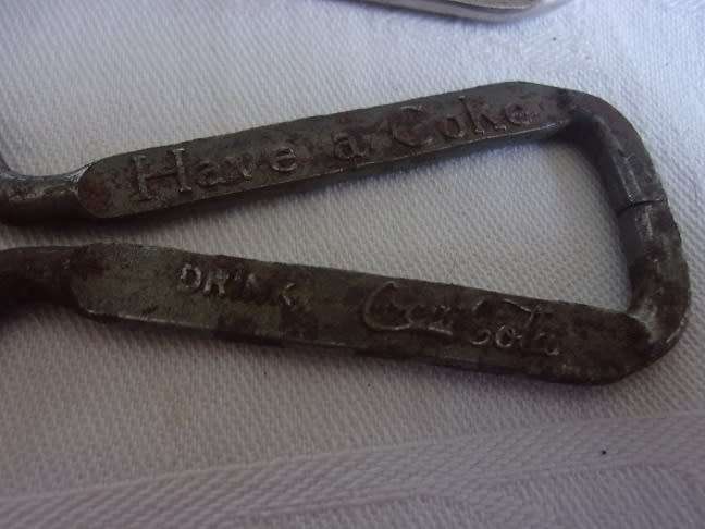 Lot of 8 vintage Coca-Cola bottle openers for 1 bid