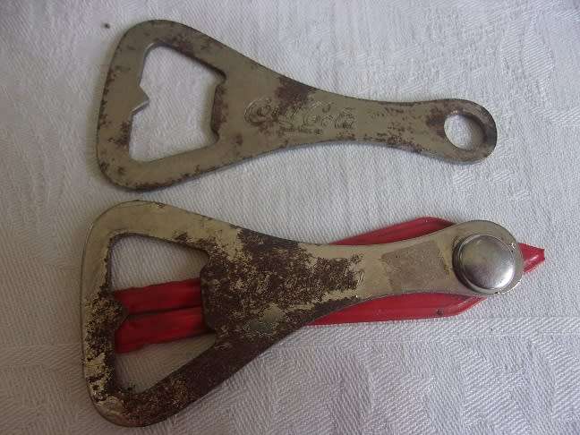Lot of 8 vintage Coca-Cola bottle openers for 1 bid