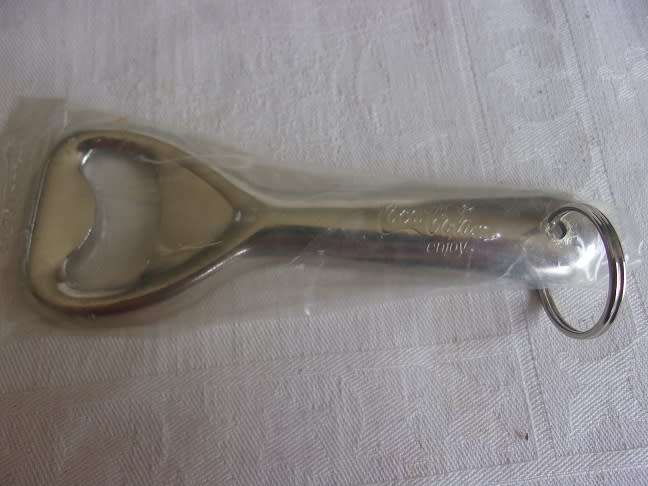 Lot of 8 vintage Coca-Cola bottle openers for 1 bid