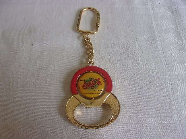 Lot of 8 vintage Coca-Cola bottle openers for 1 bid