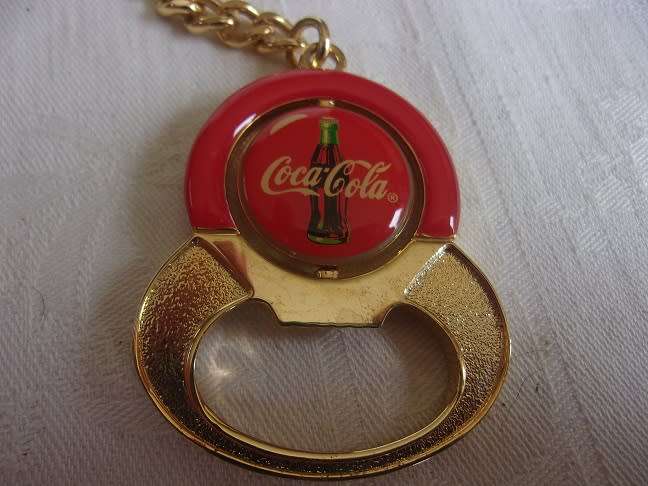 Lot of 8 vintage Coca-Cola bottle openers for 1 bid