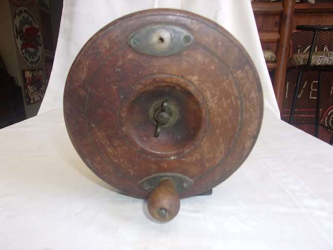 Vintage wood and brass centrepin fishing reel