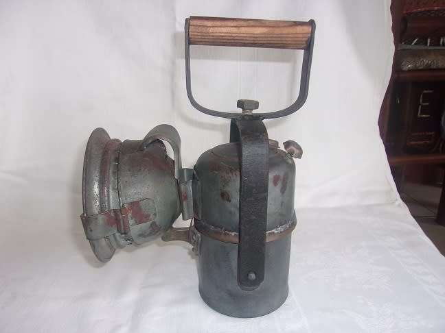 Vintage carbide lamp with reflector and brass trim