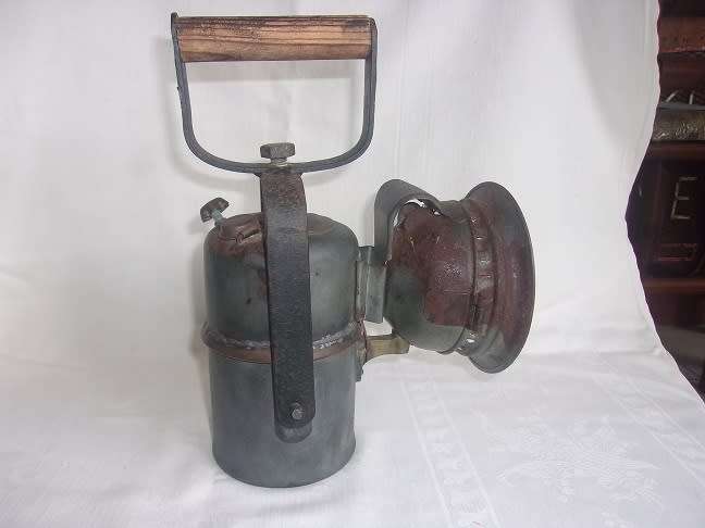 Vintage carbide lamp with reflector and brass trim