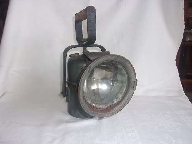Vintage carbide lamp with reflector and brass trim
