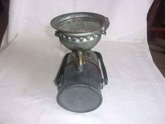 Vintage carbide lamp with reflector and brass trim