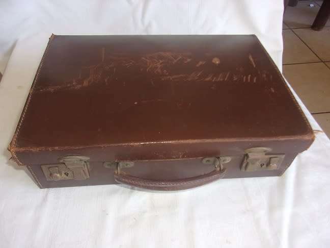 Small vintage leather attache case with brass latches