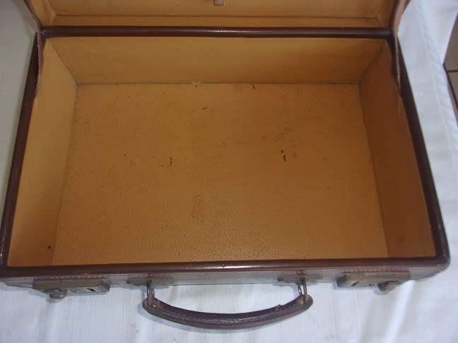 Small vintage leather attache case with brass latches