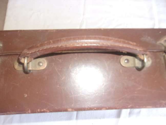 Small vintage leather attache case with brass latches