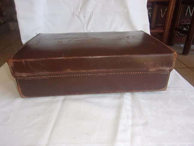 Small vintage leather attache case with brass latches