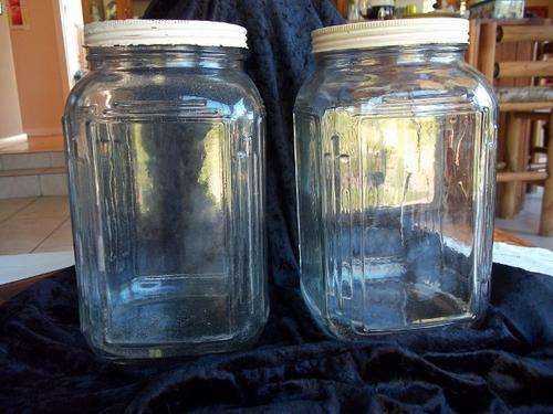 Remember these!!! Lot of 2 old bottles that used to hold sweets in the shops