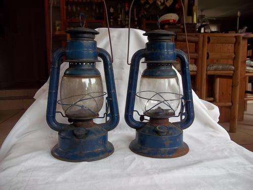 A pair of old blue paraffin hurricane lamps - one bid for both!!!