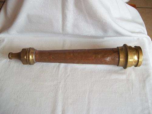 Antique brass and copper fire hose nozzle