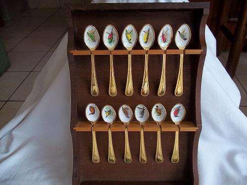Lot of 12 lovely 24K gold plated teaspoons with enamel bird designs in a stand