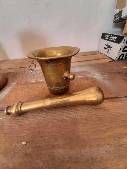 Mortar and pestle  very heavy  brass antique