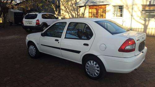 2004 FORD IKON 1.6i--5 MANUAL SPEED--WITH ONLY 135,000KM ON THE CLOCK--GOOD FOR DRIVING AROUND.
