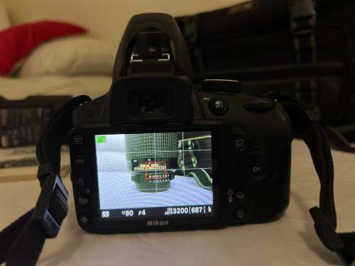 NIKON D3200 with  1x NIKON 18-55mm Lens 1x NIKON 70-300mm lens