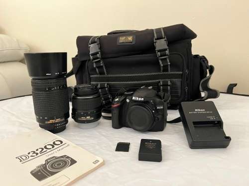 NIKON D3200 with  1x NIKON 18-55mm Lens 1x NIKON 70-300mm lens