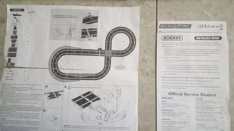 2007 HORNBY SCALEXTRIC SET - TRACKS, RAILINGS, 2 CONTROLLERS, ADAPTER ETC