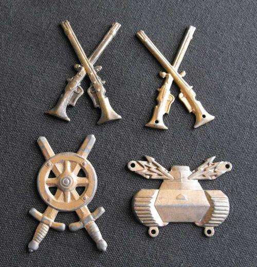 LOT OF 4 SWEDISH ARMY METAL BADGES