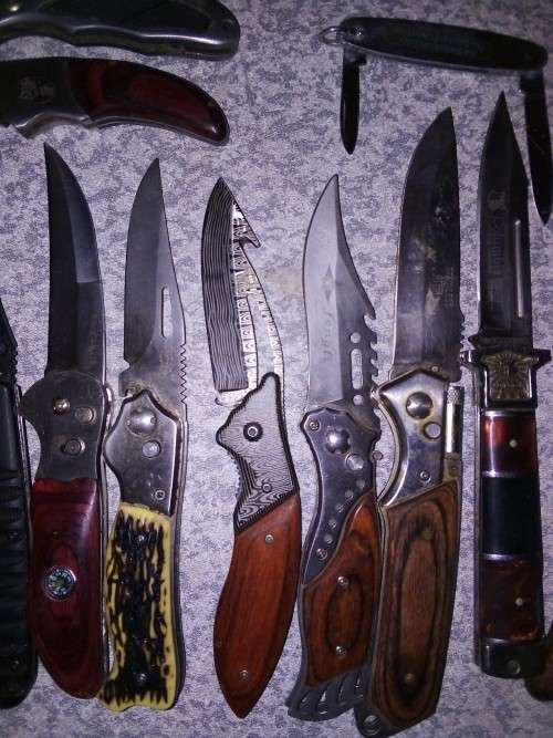 Pen Knives 14 plus Kraft Tool plus Panga Leather sheathes.