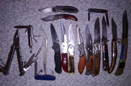 Pen Knives 14 plus Kraft Tool plus Panga Leather sheathes.