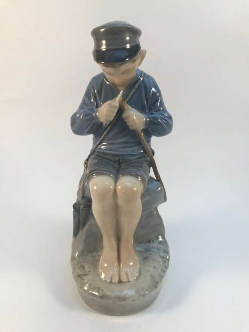 Royal Copenhagen Boy Cutting Stick #905