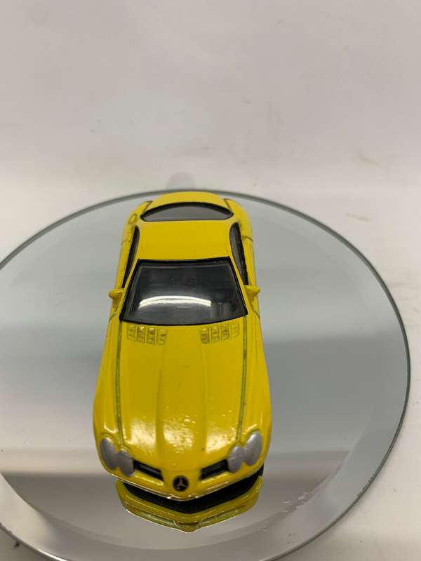 Mercedes Benz SLR McLaren yellow REALTOY 1:60 die cast car