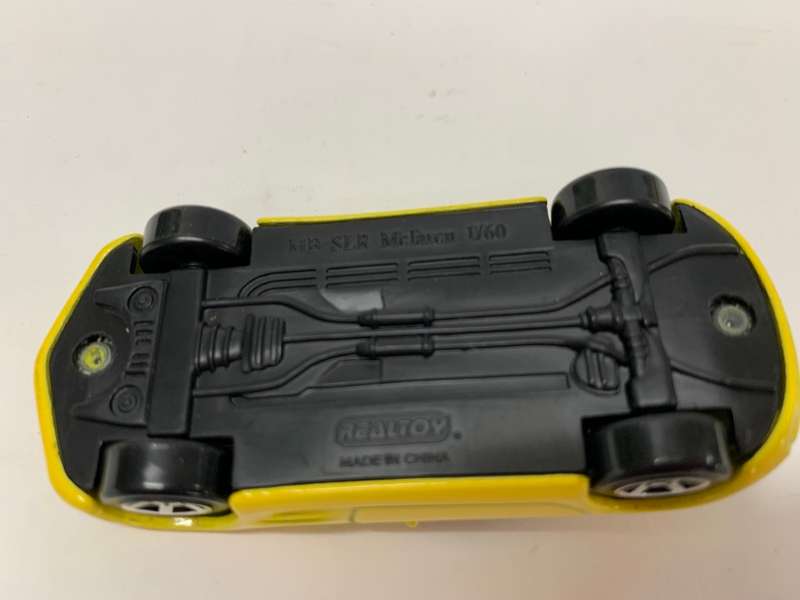 Mercedes Benz SLR McLaren yellow REALTOY 1:60 die cast car