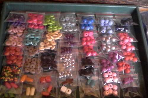 60 pkts of assorted wood beads and 20pkts of wax cords..(pink,cerise,yellow,purple and limegreen)