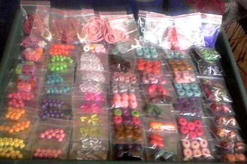 75pkts of assorted acrylic ,dolfin charms,wood,, seedbeads plus cord..pls see all in photo