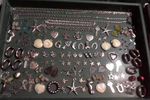 Metal Mix... 85pkts to get all in photo.chain @2 and 2@bracelet,charms,pendants etc & fancy glass
