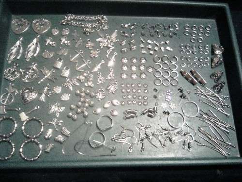 Metal mix..bid on 95pkts for all on photo..pendants,charms,findings etc