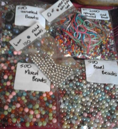 3500 glassbeads,100 metal beads,5@finding kits,satin cord,first bid r200..pls see photos