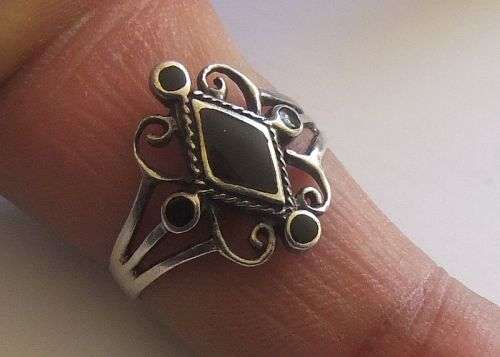 Solid 925 silver ring with black inlay...size 8...pre owned