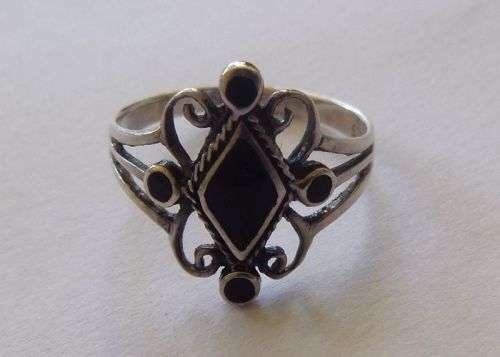Solid 925 silver ring with black inlay...size 8...pre owned