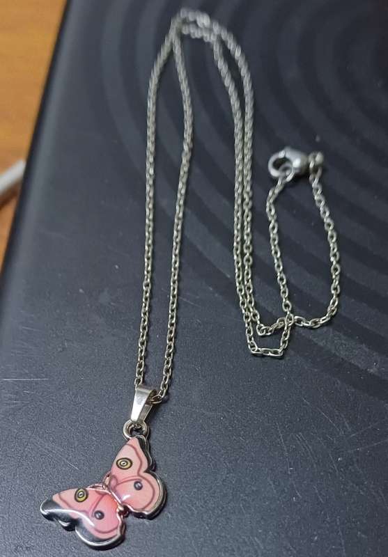 Stainless steel and enamel butterfly necklace..high quality won't fade or tarnish ..high