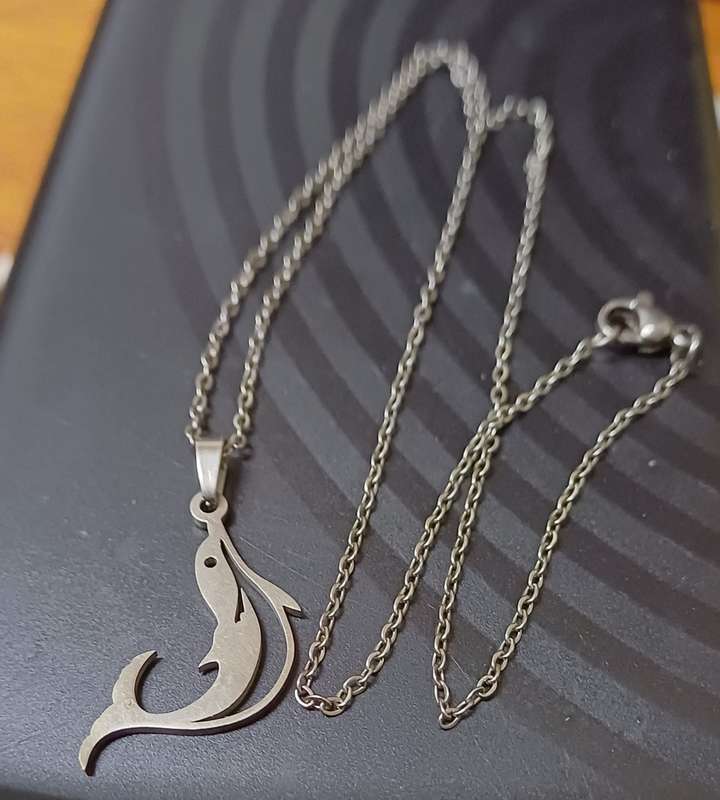 Stainless steel dolfin necklace ..high quality won't fade or tarnish