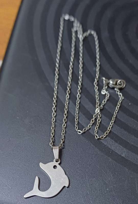 Stainless steel dolfin necklace ..high quality won't fade or tarnish