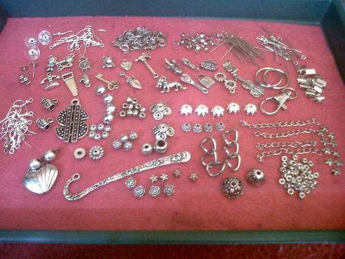 Assortment of (spacers,charms,findings,Pendants)Bid on all