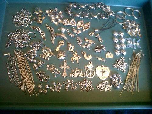 Metal mix with Bracelet,pendants,charms, etc(Bid on 40pkts for whole mix)