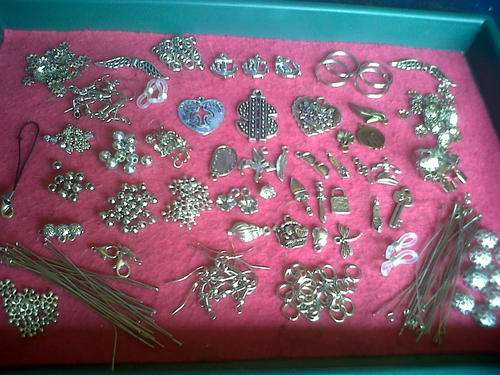 Metal mix with pendants,charms, etc(Bid on 40pkts for whole mix)