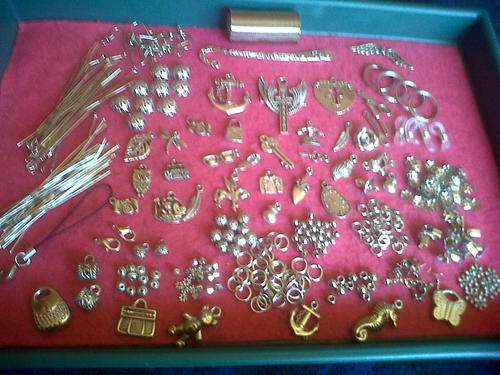 Metal mix with pendants,charms, etc(Bid on 40pkts for whole mix)
