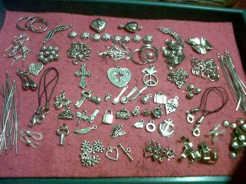 Metal mix with pendants,charms, etc(Bid on 40pkts for whole mix)