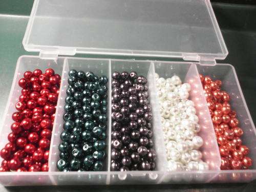 Container(new) with 500 glass pearls 6mm plus 10 free filligree beads 6mm