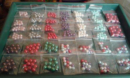 400 assorted pearls in 6,8,10 mm(10 per pkt)bid on 40 pkts