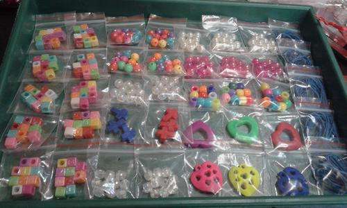 assorted acrylic beads and waxcord..40pkts you bid on..pls see photo